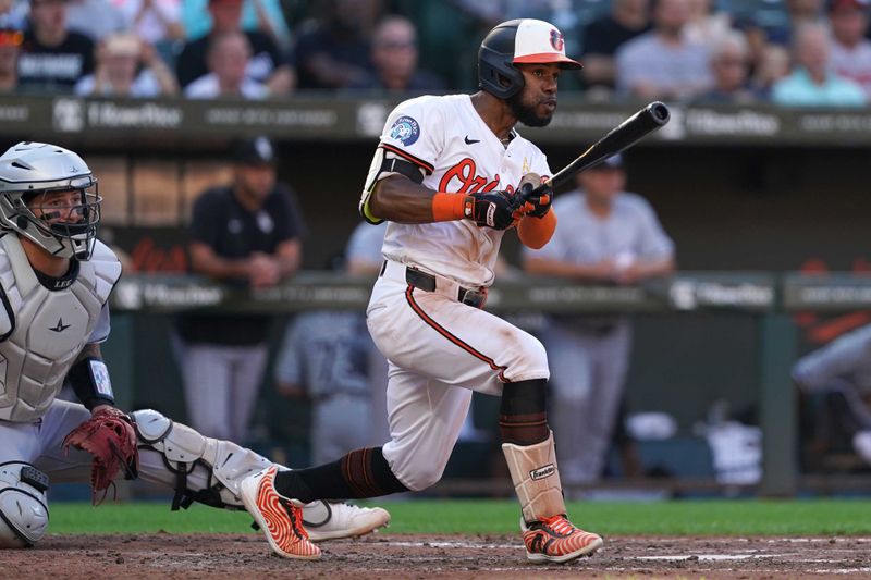 Sep 2, 2024; Baltimore, Maryland, USA; Baltimore Orioles outfielder Cedric Mullins (31) doubles to drive in a run during the sixth inning against the Chicago White Sox at Oriole Park at Camden Yards. Mandatory Credit: Mitch Stringer-USA TODAY Sports