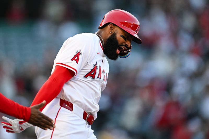 May 11, 2024; Anaheim, California, USA; Los Angeles Angels outfielder Jo Adell (7) reacts after hitting a home run against the Kansas City Royals during the second inning at Angel Stadium. Mandatory Credit: Jonathan Hui-USA TODAY Sports