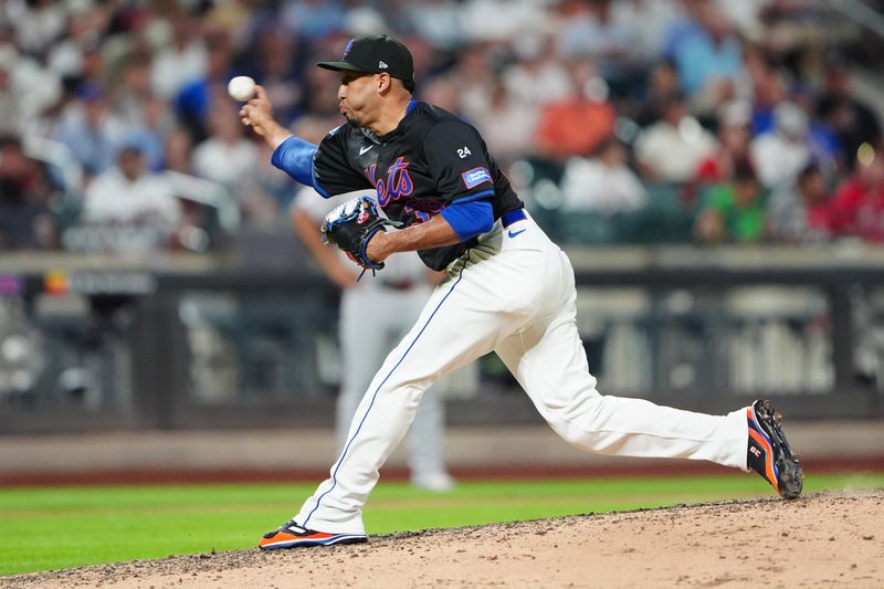 Jul 25, 2024; New York City, New York, USA; New York Mets pitcher Edwin Diaz (39) delivers a pitch against the Atlanta Braves during the ninth inning at Citi Field. Mandatory Credit: Gregory Fisher-USA TODAY Sports