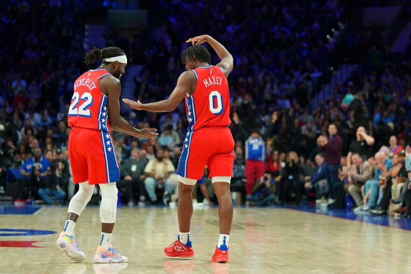 PHILADELPHIA, PENNSYLVANIA - JANUARY 12: Patrick Beverley #22 of the Philadelphia 76ers celebrates with Tyrese Maxey #0 in the first half against the Sacramento Kings at the Wells Fargo Center on January 12, 2024 in Philadelphia, Pennsylvania. NOTE TO USER: User expressly acknowledges and agrees that, by downloading and or using this photograph, User is consenting to the terms and conditions of the Getty Images License Agreement. (Photo by Mitchell Leff/Getty Images)