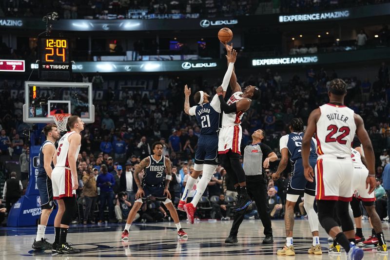 DALLAS, TX - MARCH 7: Bam Adebayo #13 of the Miami Heat goes up for the tipoff during the game against the Dallas Mavericks on March 7, 2024 at the American Airlines Center in Dallas, Texas. NOTE TO USER: User expressly acknowledges and agrees that, by downloading and or using this photograph, User is consenting to the terms and conditions of the Getty Images License Agreement. Mandatory Copyright Notice: Copyright 2024 NBAE (Photo by Glenn James/NBAE via Getty Images)