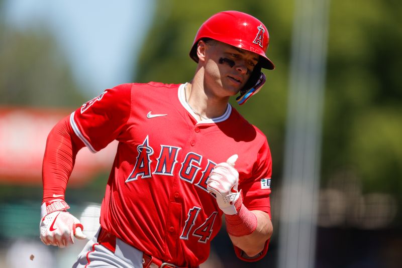 May 22, 2025; West Sacramento, California, USA; Los Angeles Angels catcher Logan O'Hoppe (14) runs the bases after hitting a one run home run during the seventh inning against the Athletics at Sutter Health Park. Mandatory Credit: Sergio Estrada-Imagn Images