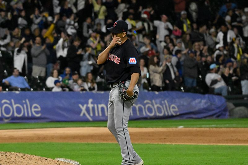 May 10, 2024; Chicago, Illinois, USA;  Cleveland Guardians pitcher Carlos Carrasco (59) reacts to Chicago White Sox catcher Korey Lee (26) hitting a home run during the seventh inning at Guaranteed Rate Field. Mandatory Credit: Matt Marton-USA TODAY Sports