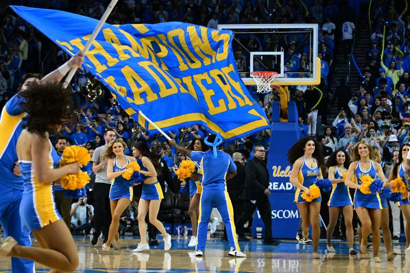 Mar 4, 2023; Los Angeles, California, USA; UCLA Bruins cheerleaders celebrate after the Bruins defeated the Arizona Wildcats at Pauley Pavilion presented by Wescom. Mandatory Credit: Richard Mackson-USA TODAY Sports