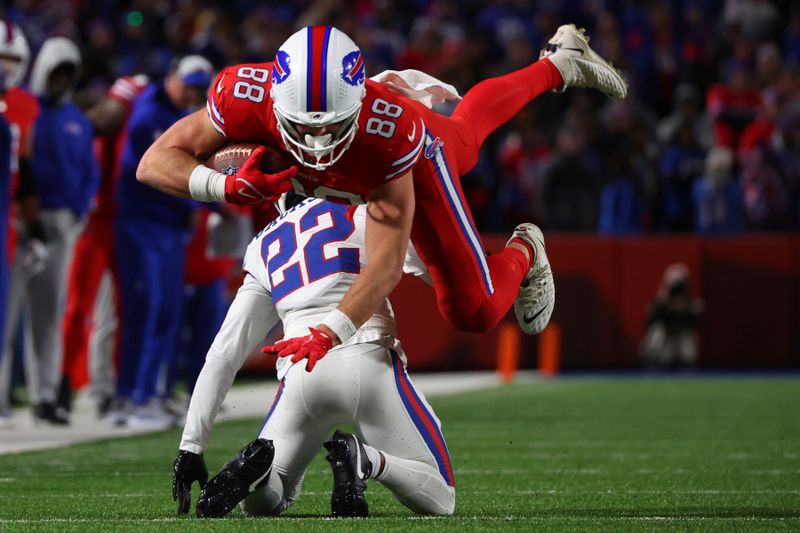 Buffalo Bills tight end Dawson Knox (88) is tackled by New York Giants cornerback Adoree' Jackson (22) during the second half of an NFL football game in Orchard Park, N.Y., Sunday Oct. 15, 2023. (AP Photo/ Jeffrey T. Barnes)