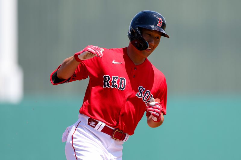 Mar 28, 2023; Fort Myers, Florida, USA;  Boston Red Sox left fielder Masataka Yoshida (7) runs the bases after hitting a two-run home run against the Atlanta Braves in the first inning during spring training at JetBlue Park at Fenway South. Mandatory Credit: Nathan Ray Seebeck-USA TODAY Sports