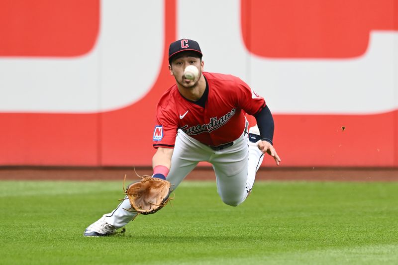 Aug 25, 2024; Cleveland, Ohio, USA; Cleveland Guardians left fielder Steven Kwan (38) catches a ball hit by Texas Rangers third baseman Ezequiel Duran (not pictured) during the third inning at Progressive Field. Mandatory Credit: Ken Blaze-USA TODAY Sports