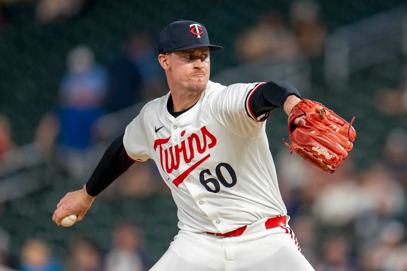 Sep 9, 2024; Minneapolis, Minnesota, USA; Minnesota Twins pitcher Scott Blewett (60) delivers a pitch against the Los Angeles Angels in the ninth inning at Target Field. Mandatory Credit: Jesse Johnson-Imagn Images