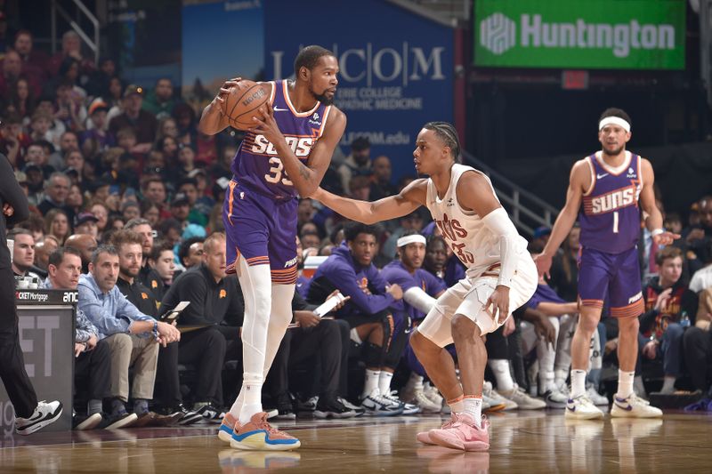 CLEVELAND, OH - MARCH 11: Kevin Durant #35 of the Phoenix Suns handles the ball during the game against the Cleveland Cavaliers on March 11, 2024 at Rocket Mortgage FieldHouse in Cleveland, Ohio. NOTE TO USER: User expressly acknowledges and agrees that, by downloading and/or using this Photograph, user is consenting to the terms and conditions of the Getty Images License Agreement. Mandatory Copyright Notice: Copyright 2024 NBAE (Photo by David Liam Kyle/NBAE via Getty Images)