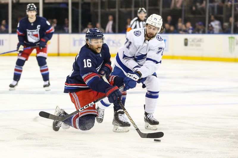 Feb 7, 2024; New York, New York, USA; New York Rangers center Vincent Trocheck (16) and Tampa Bay Lightning center Anthony Cirelli (71) battle for control of the puck in the second period at Madison Square Garden. Mandatory Credit: Wendell Cruz-USA TODAY Sports