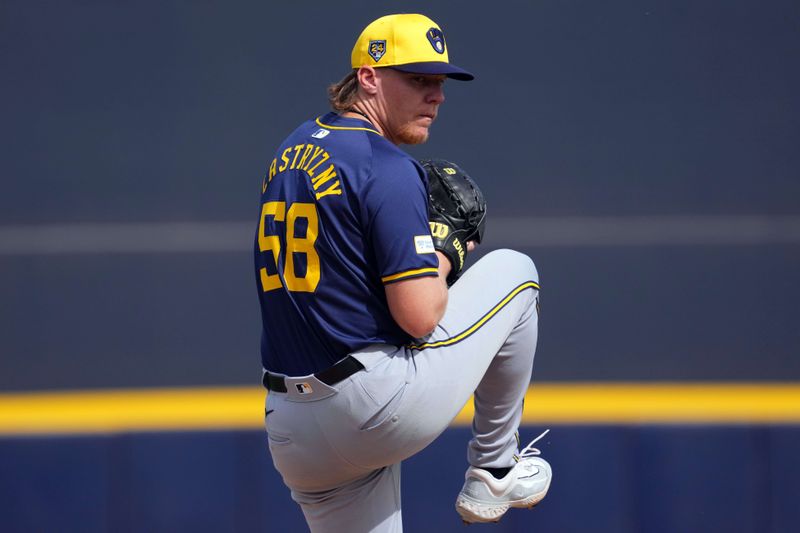 Feb 24, 2024; Peoria, Arizona, USA; Milwaukee Brewers pitcher Rob Zastrynzy (58) pitches against the San Diego Padres during the first inning of a Spring Training game at Peoria Sports Complex. Mandatory Credit: Joe Camporeale-USA TODAY Sports