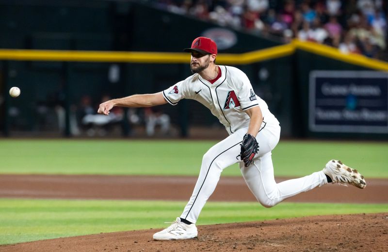 Apr 22, 2025; Phoenix, Arizona, USA; Arizona Diamondbacks pitcher Ryan Thompson in the seventh inning against the Tampa Bay Rays at Chase Field. Mandatory Credit: Mark J. Rebilas-Imagn Images