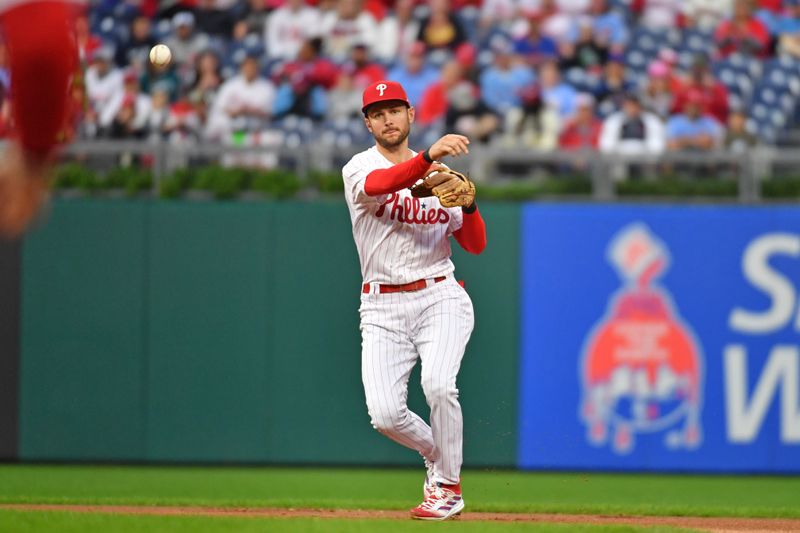 Sep 24, 2023; Philadelphia, Pennsylvania, USA; Philadelphia Phillies shortstop Trea Turner (7) throws to first base during the first inning against the New York Mets at Citizens Bank Park. Mandatory Credit: Eric Hartline-USA TODAY Sports