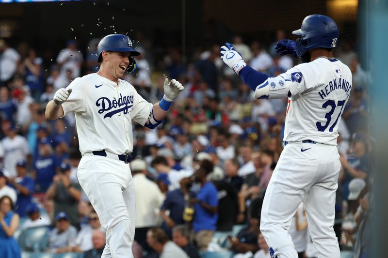 Jul 5, 2024; Los Angeles, California, USA;  Los Angeles Dodgers catcher Will Smith (16) is greeted by right fielder Teoscar Hernandez (37) after hitting a solo home run during the third inning against the Milwaukee Brewers at Dodger Stadium. Mandatory Credit: Kiyoshi Mio-USA TODAY Sports