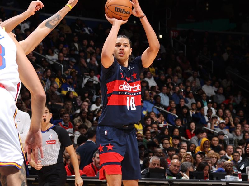 WASHINGTON, DC -? NOVEMBER 4: Kyshawn George #18 of the Washington Wizards shoots the ball during the game against the Golden State Warriors on November 4, 2024 at Capital One Arena in Washington, DC. NOTE TO USER: User expressly acknowledges and agrees that, by downloading and or using this Photograph, user is consenting to the terms and conditions of the Getty Images License Agreement. Mandatory Copyright Notice: Copyright 2024 NBAE (Photo by Stephen Gosling/NBAE via Getty Images)