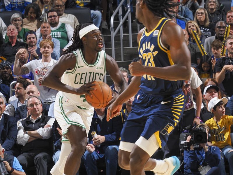 INDIANAPOLIS, IN - OCTOBER 30: Jrue Holiday #4 of the Boston Celtics passes the ball during the game on October 30, 2024 at Gainbridge Fieldhouse in Indianapolis, Indiana. NOTE TO USER: User expressly acknowledges and agrees that, by downloading and or using this Photograph, user is consenting to the terms and conditions of the Getty Images License Agreement. Mandatory Copyright Notice: Copyright 2024 NBAE (Photo by Ron Hoskins/NBAE via Getty Images)