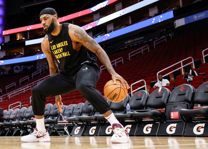 HOUSTON, TEXAS - NOVEMBER 08: LeBron James #23 of the Los Angeles Lakers warms up prior to facing the Houston Rockets at Toyota Center on November 08, 2023 in Houston, Texas. NOTE TO USER: User expressly acknowledges and agrees that, by downloading and or using this photograph, User is consenting to the terms and conditions of the Getty Images License Agreement.? (Photo by Carmen Mandato/Getty Images)