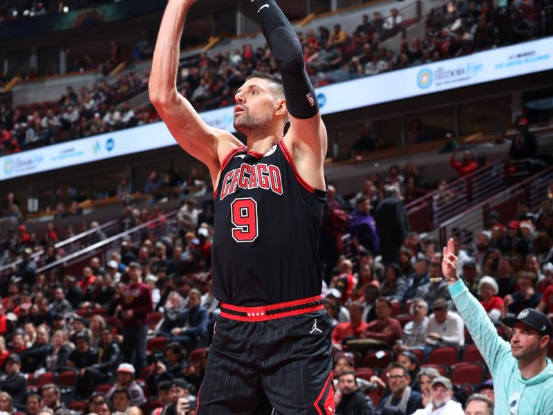 CHICAGO, IL - NOVEMBER 22: Nikola Vucevic #9 of the Chicago Bulls three point basket during the game against the Atlanta Hawks during the Emirates NBA Cup game on November 22, 2024 at United Center in Chicago, Illinois. NOTE TO USER: User expressly acknowledges and agrees that, by downloading and or using this photograph, User is consenting to the terms and conditions of the Getty Images License Agreement. Mandatory Copyright Notice: Copyright 2024 NBAE (Photo by Jeff Haynes/NBAE via Getty Images)