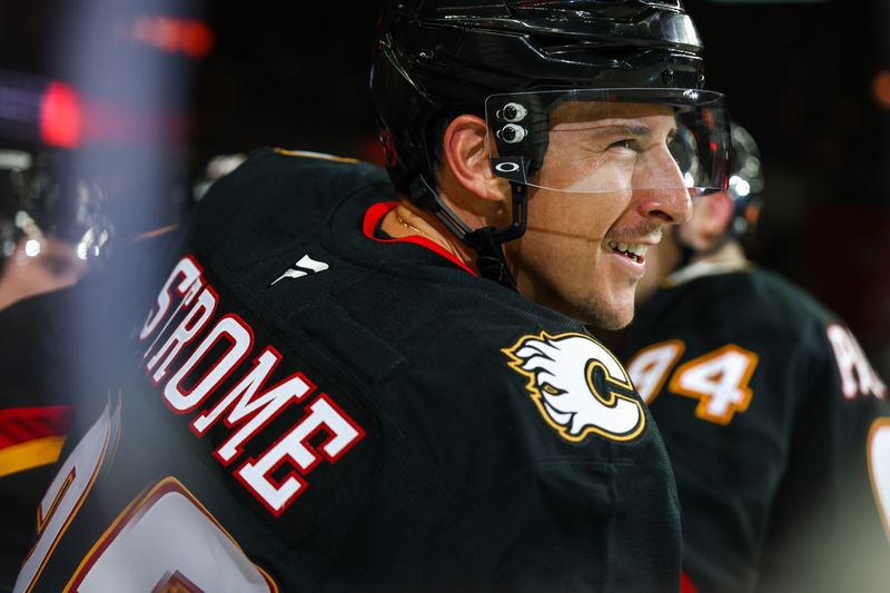 Mar 7, 2026; Calgary, Alberta, CAN; Calgary Flames center Ryan Strome (22) celebrates his goal with teammates against the Carolina Hurricanes during the second period at Scotiabank Saddledome. Mandatory Credit: Sergei Belski-Imagn Images
