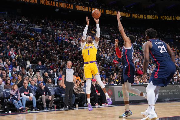 PHILADELPHIA, PA - NOVEMBER 27:D'Angelo Russell #1 of the Los Angeles Lakers shoots the ball during the game against the Philadelphia 76ers  on November 27, 2023 at the Wells Fargo Center in Philadelphia, Pennsylvania NOTE TO USER: User expressly acknowledges and agrees that, by downloading and/or using this Photograph, user is consenting to the terms and conditions of the Getty Images License Agreement. Mandatory Copyright Notice: Copyright 2023 NBAE (Photo by Jesse D. Garrabrant/NBAE via Getty Images)