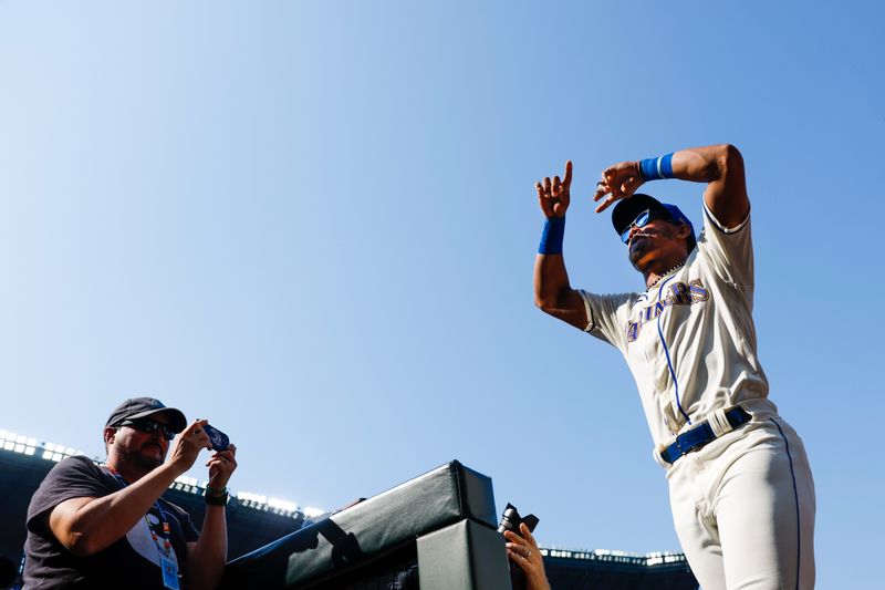 Aug 27, 2023; Seattle, Washington, USA; Seattle Mariners center fielder Julio Rodriguez (44) celebrates following a 3-2 victory against the Kansas City Royals at T-Mobile Park. Mandatory Credit: Joe Nicholson-USA TODAY Sports