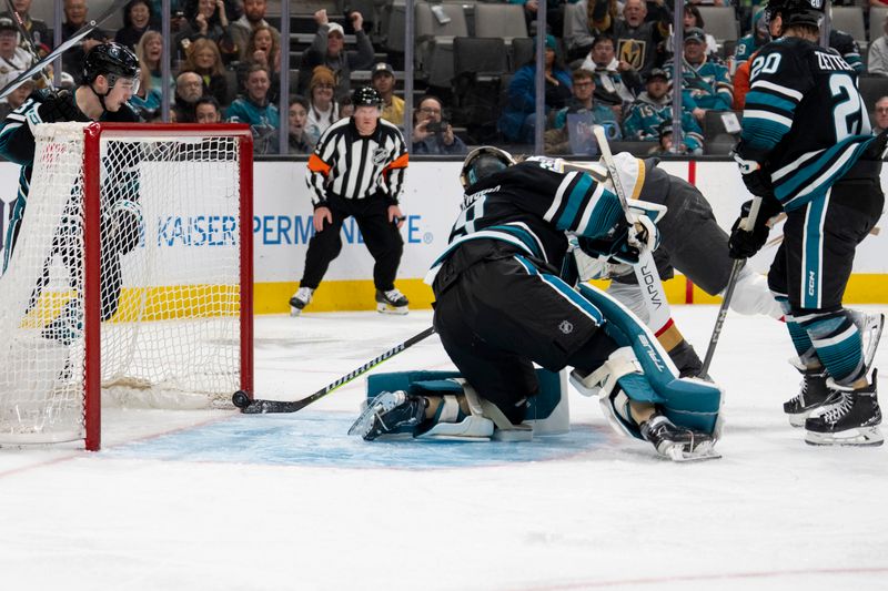 Feb 19, 2024; San Jose, California, USA; Vegas Golden Knights center William Karlsson (71) shoots the goal against San Jose Sharks goalie Mackenzie Blackwood (29) during the first period at SAP Center at San Jose. Mandatory Credit: Neville E. Guard-USA TODAY Sports