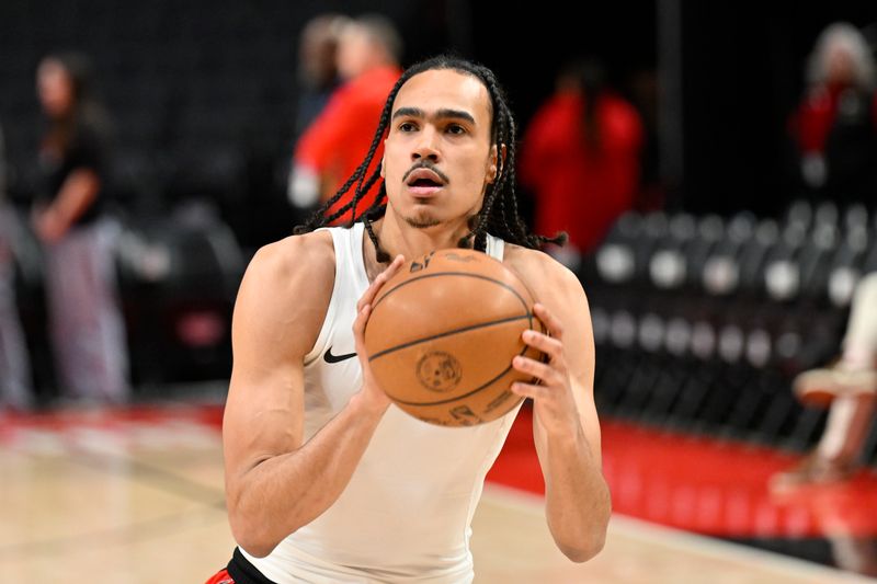 PORTLAND, OREGON - MARCH 06: Dalano Banton #5 of the Portland Trail Blazers warms up before the game against the Oklahoma City Thunder at the Moda Center on March 06, 2024 in Portland, Oregon. NOTE TO USER: User expressly acknowledges and agrees that, by downloading and or using this photograph, User is consenting to the terms and conditions of the Getty Images License Agreement. (Photo by Alika Jenner/Getty Images)