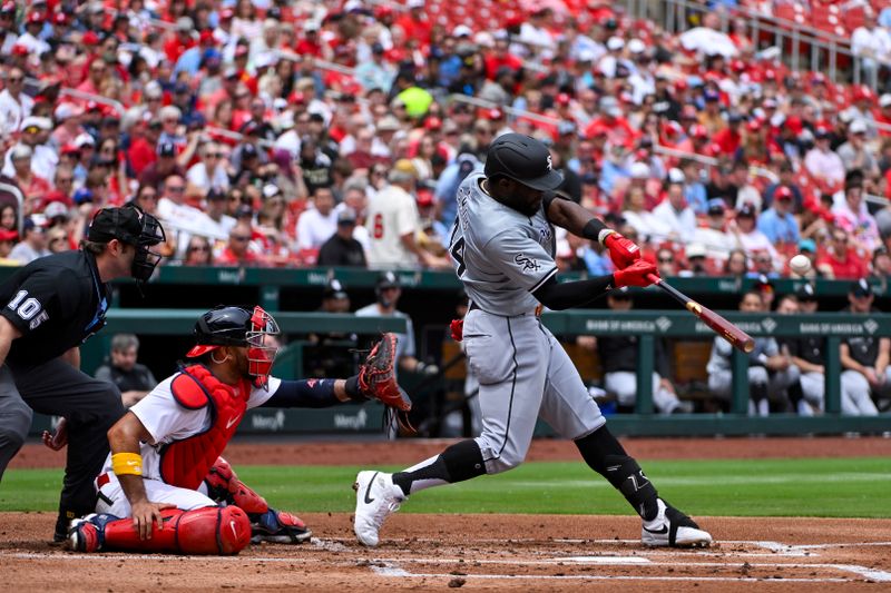May 5, 2024; St. Louis, Missouri, USA;  Chicago White Sox third baseman Bryan Ramos (44) hits a one run sacrifice fly against the St. Louis Cardinals during the second inning at Busch Stadium. Mandatory Credit: Jeff Curry-USA TODAY Sports