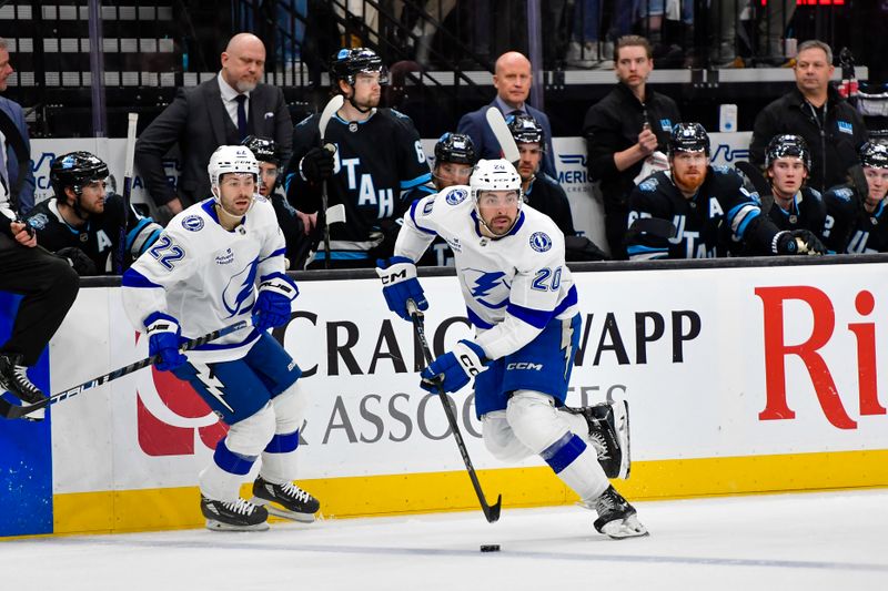 Mar 22, 2025; Salt Lake City, Utah, USA; Tampa Bay Lightning left wing Nick Paul (20) looks to pass against the Utah Hockey Club during third period at the Delta Center. Mandatory Credit: Peter Creveling-Imagn Images