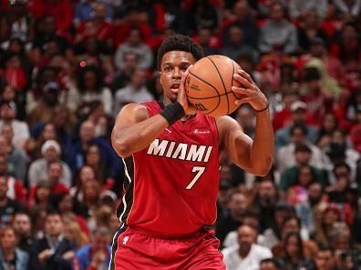 MIAMI, FL - DECEMBER 25:  Kyle Lowry #7 of the Miami Heat passes the ball during the game   on December 25, 2023 at Kaseya Center Arena in Miami, Florida. NOTE TO USER: User expressly acknowledges and agrees that, by downloading and or using this Photograph, user is consenting to the terms and conditions of the Getty Images License Agreement. Mandatory Copyright Notice: Copyright 2023 NBAE (Photo by Issac Baldizon/NBAE via Getty Images)