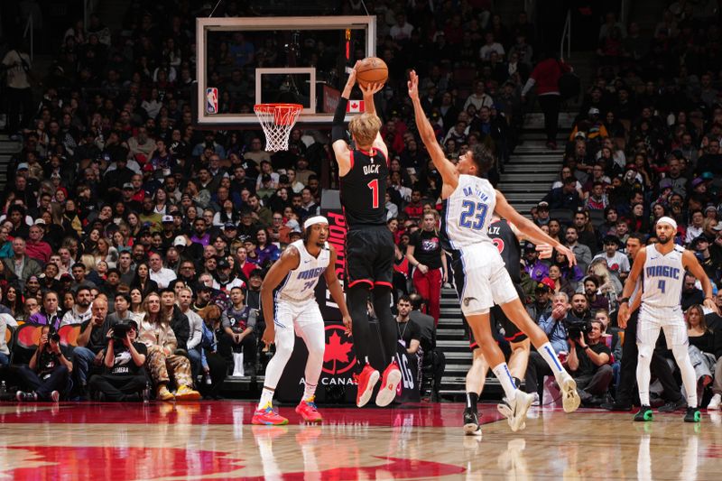 TORONTO, CANADA - JANUARY 3: Gradey Dick #1 of the Toronto Raptors shoots the ball during the game against the Orlando Magic on January 3, 2025 at the Scotiabank Arena in Toronto, Ontario, Canada.  NOTE TO USER: User expressly acknowledges and agrees that, by downloading and or using this Photograph, user is consenting to the terms and conditions of the Getty Images License Agreement.  Mandatory Copyright Notice: Copyright 2025 NBAE(Photo by Mark Blinch/NBAE via Getty Images)