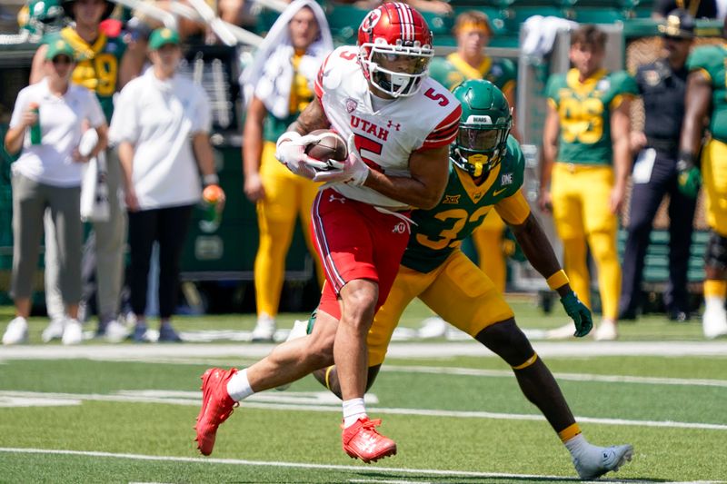 Sep 9, 2023; Waco, Texas, USA; Utah Utes wide receiver Mycah Pittman (5) makes the catch in front of Baylor Bears safety DJ Coleman (33) during the second half at McLane Stadium. Mandatory Credit: Raymond Carlin III-USA TODAY Sports