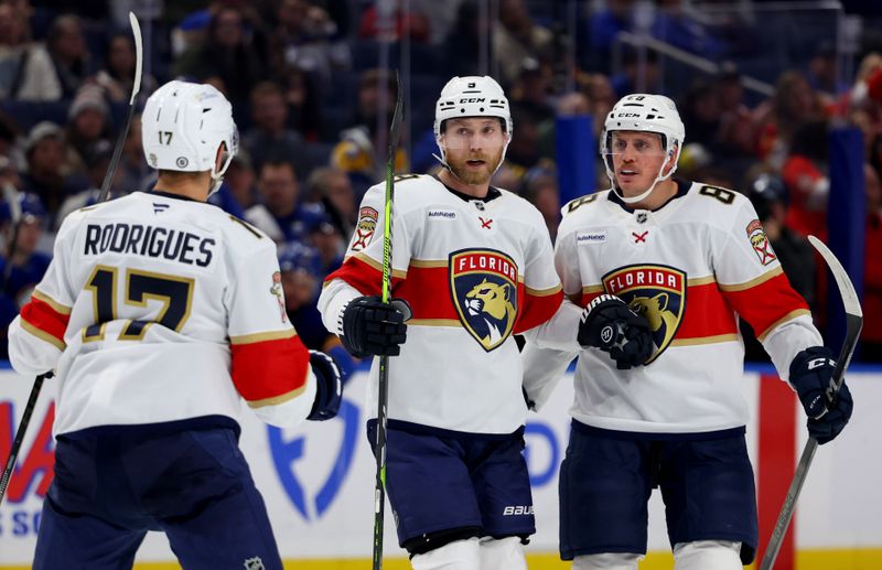 Oct 28, 2024; Buffalo, New York, USA;  Florida Panthers center Sam Bennett (9) celebrates his goal with teammates during the third period against the Buffalo Sabres at KeyBank Center. Mandatory Credit: Timothy T. Ludwig-Imagn Images