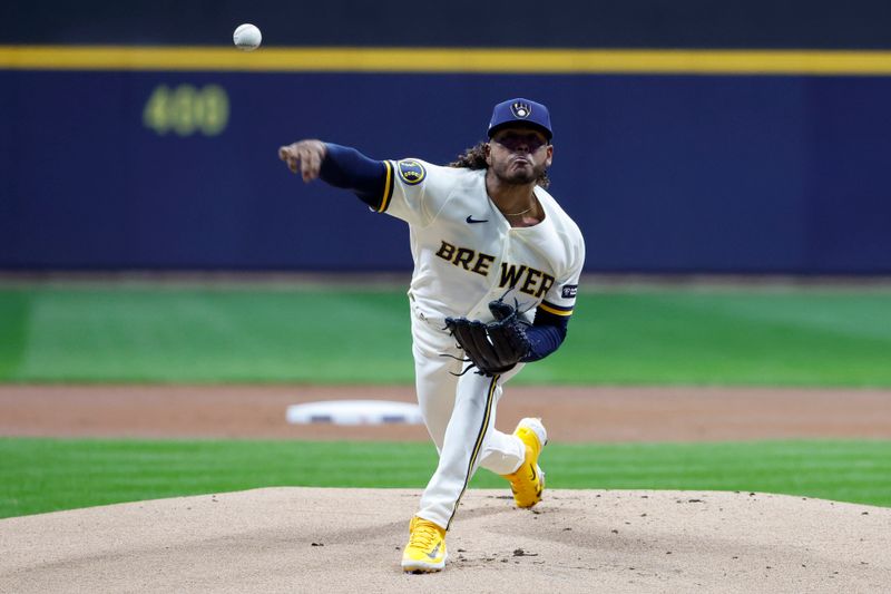 Oct 4, 2023; Milwaukee, Wisconsin, USA; Milwaukee Brewers starting pitcher Freddy Peralta (51) pitches in the first inning against the Arizona Diamondbacks during game two of the Wildcard series for the 2023 MLB playoffs at American Family Field. Mandatory Credit: Kamil Krzaczynski-USA TODAY Sports