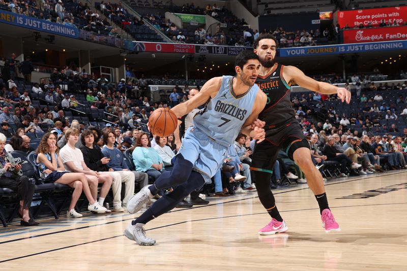 MEMPHIS, TN - MARCH 12: Santi Aldama #7 of the Memphis Grizzlies dribbles the ball during the game against the Washington Wizards on March 12, 2024 at FedExForum in Memphis, Tennessee. NOTE TO USER: User expressly acknowledges and agrees that, by downloading and or using this photograph, User is consenting to the terms and conditions of the Getty Images License Agreement. Mandatory Copyright Notice: Copyright 2024 NBAE (Photo by Joe Murphy/NBAE via Getty Images)