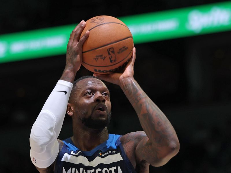 MINNEAPOLIS, MN -  NOVEMBER 4: Julius Randle #30 of the Minnesota Timberwolves free throw during the game against the Charlotte Hornets on November 4, 2024 at Target Center in Minneapolis, Minnesota. NOTE TO USER: User expressly acknowledges and agrees that, by downloading and or using this Photograph, user is consenting to the terms and conditions of the Getty Images License Agreement. Mandatory Copyright Notice: Copyright 2024 NBAE (Photo by David Sherman/NBAE via Getty Images)