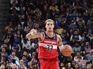 SAN FRANCISCO, CA - DECEMBER 22: Kyle Kuzma #33 of the Washington Wizards brings the ball up court against the Golden State Warriors on December 22, 2023 at Chase Center in San Francisco, California. NOTE TO USER: User expressly acknowledges and agrees that, by downloading and or using this photograph, user is consenting to the terms and conditions of Getty Images License Agreement. Mandatory Copyright Notice: Copyright 2023 NBAE (Photo by Noah Graham/NBAE via Getty Images)