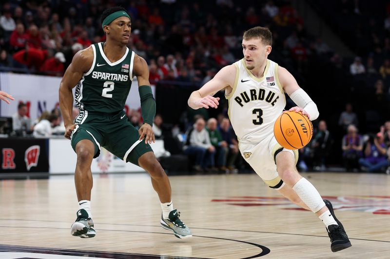 Mar 15, 2024; Minneapolis, MN, USA; Purdue Boilermakers guard Braden Smith (3) works around Michigan State Spartans guard Tyson Walker (2) during the first half at Target Center. Mandatory Credit: Matt Krohn-USA TODAY Sports