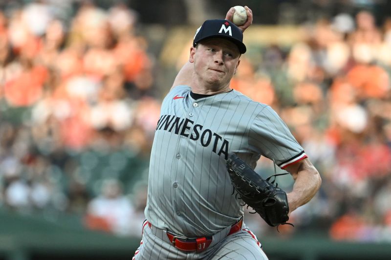 Apr 15, 2024; Baltimore, Maryland, USA;  Minnesota Twins starting pitcher Louie Varland throws a first inning pitch against the Baltimore Orioles at Oriole Park at Camden Yards. Mandatory Credit: Tommy Gilligan-USA TODAY Sports