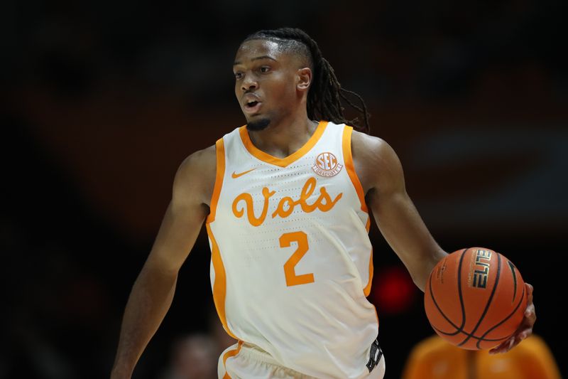 Jan 4, 2025; Knoxville, Tennessee, USA; Tennessee Volunteers guard Chaz Lanier (2) brings the ball up court against the Arkansas Razorbacks during the first half at Thompson-Boling Arena at Food City Center. Mandatory Credit: Randy Sartin-Imagn Images