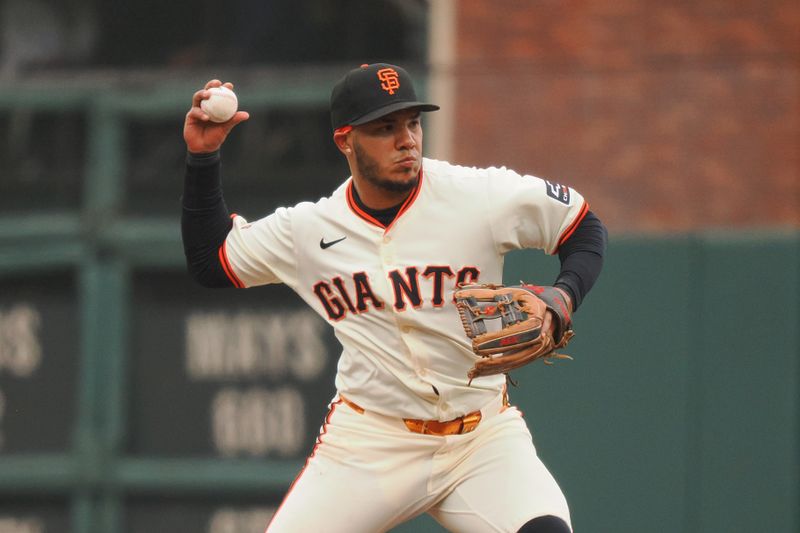 Apr 24, 2024; San Francisco, California, USA; San Francisco Giants second baseman Thairo Estrada (39) throws the ball to first base against the New York Mets during the fifth inning at Oracle Park. Mandatory Credit: Kelley L Cox-USA TODAY Sports