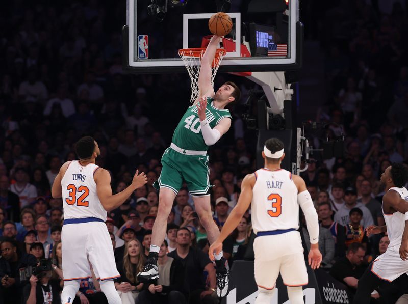 NEW YORK, NEW YORK - MAY 16: Luke Kornet #40 of the Boston Celtics grabs a rebound against the New York Knicks in the first quarter of Game Six of the Eastern Conference Second Round NBA Playoffs at Madison Square Garden on May 16, 2025 in New York City. NOTE TO USER: User expressly acknowledges and agrees that, by downloading and or using this photograph, User is consenting to the terms and conditions of the Getty Images License Agreement. (Photo by Al Bello/Getty Images)