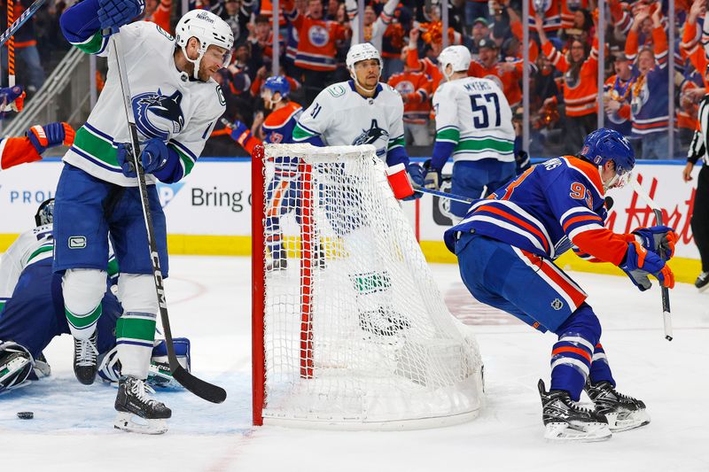 May 18, 2024; Edmonton, Alberta, CAN; Edmonton Oilers forward Ryan Nugent-Hopkins (93) celebrates after scoring a goal during the third period against the Vancouver Canucks in game six of the second round of the 2024 Stanley Cup Playoffs at Rogers Place. Mandatory Credit: Perry Nelson-USA TODAY Sports