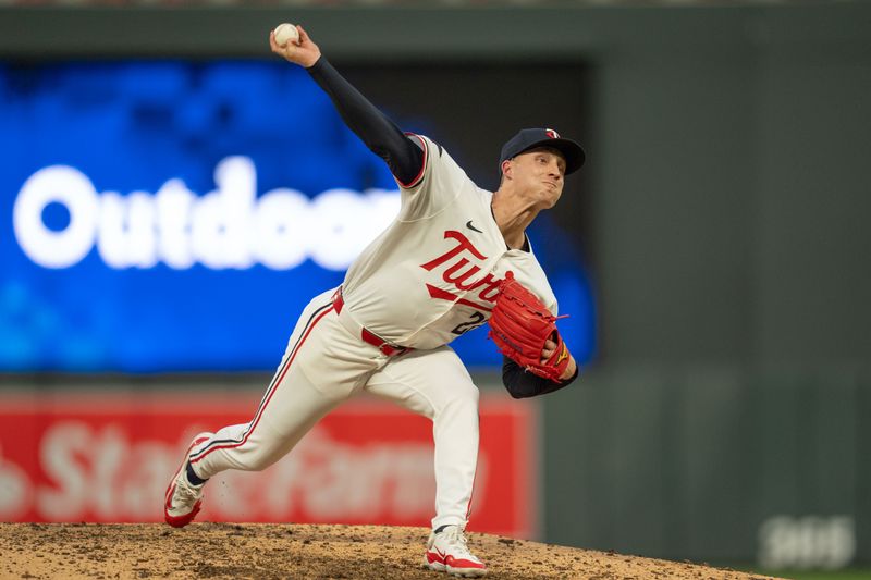 Jul 2, 2024; Minneapolis, Minnesota, USA; Minnesota Twins pitcher Griffin Jax (22) pitches to the Detroit Tigers in the eighth inning at Target Field. Mandatory Credit: Matt Blewett-USA TODAY Sports