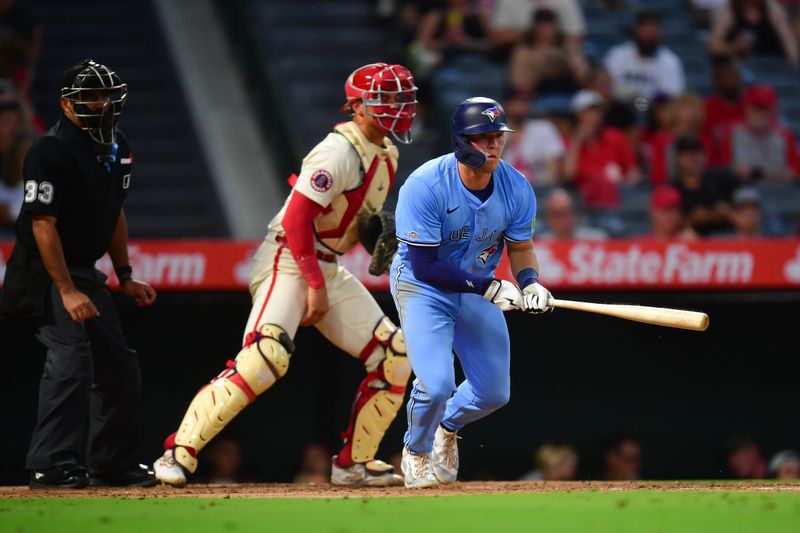 Aug 12, 2024; Anaheim, California, USA; Toronto Blue Jays second baseman Will Wagner (7) hits a single against the Los Angeles Angels during the fifth inning at Angel Stadium. Mandatory Credit: Gary A. Vasquez-USA TODAY Sports