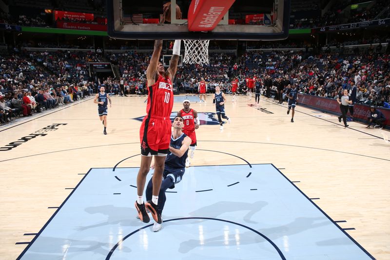 MEMPHIS, TN - FEBRUARY 14: Jabari Smith Jr. #10 of the Houston Rockets drives to the basket during the game against the Memphis Grizzlies on February 14, 2024 at FedExForum in Memphis, Tennessee. NOTE TO USER: User expressly acknowledges and agrees that, by downloading and or using this photograph, User is consenting to the terms and conditions of the Getty Images License Agreement. Mandatory Copyright Notice: Copyright 2024 NBAE (Photo by Joe Murphy/NBAE via Getty Images)