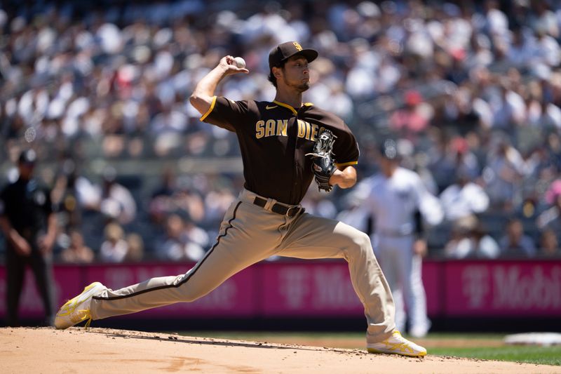 May 28, 2023; Bronx, New York, USA; San Diego Padres pitcher Yu Darvish (11) delivers a pitch against the New York Yankees during the first inning at Yankee Stadium. Mandatory Credit: Gregory Fisher-USA TODAY Sports