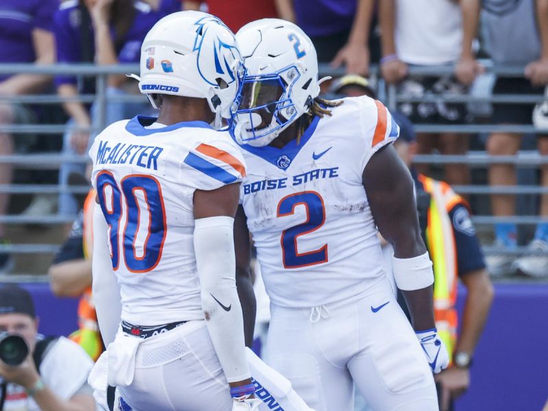 Sep 2, 2023; Seattle, Washington, USA; Boise State Broncos running back Ashton Jeanty (2) celebrates with wide receiver Eric McAlister (80) after rushing for a touchdown against the Washington Huskies during the first quarter at Alaska Airlines Field at Husky Stadium. Mandatory Credit: Joe Nicholson-USA TODAY Sports