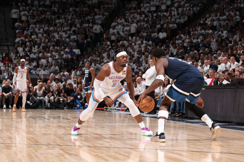 MINNEAPOLIS, MN - MAY 26: Anthony Edwards #5 of the Minnesota Timberwolves handles the ball while Luguentz Dort #5 of the Oklahoma City Thunder plays defense during the game during Game Four of the Western Conference Finals on February 1, 2025 at Target Center in Minneapolis, Minnesota. NOTE TO USER: User expressly acknowledges and agrees that, by downloading and or using this Photograph, user is consenting to the terms and conditions of the Getty Images License Agreement. Mandatory Copyright Notice: Copyright 2025 NBAE (Photo by David Sherman/NBAE via Getty Images)
