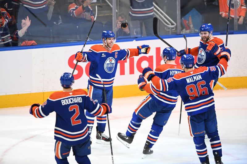 May 10, 2025; Edmonton, Alberta, CAN; Edmonton Oilers centre Connor McDavid (97) celebrates a goal with Oilers left winger Zach Hyman (18) during the third period in game three of the second round of the 2025 Stanley Cup Playoffs at Rogers Place. Mandatory Credit: Walter Tychnowicz-Imagn Images